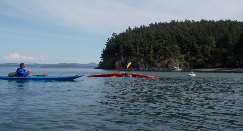 adults sea kayaking in san juan islands